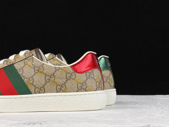 gu ace embroidered low-top sneaker