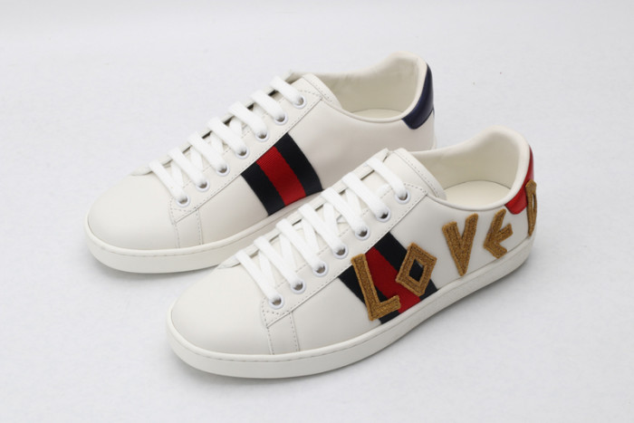 gu ace embroidered low-top sneaker