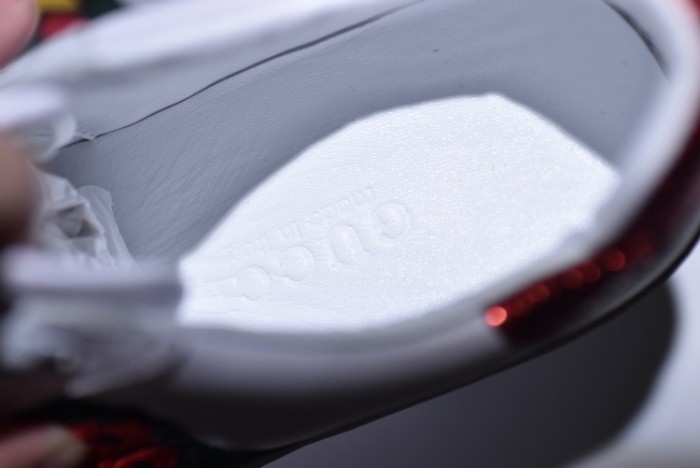 gu ace embroidered low-top sneaker with ladybird