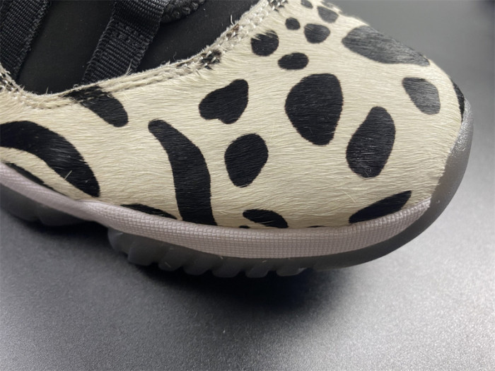 air jordan 11 “animal instinct” black / red / sail / white ar0715-010